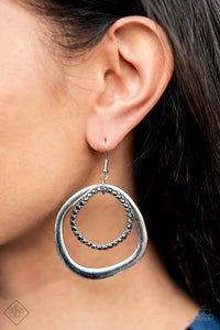 Spinning With Sass Silver Earrings
